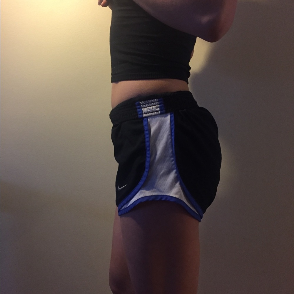Black Nike shorts with blue trim